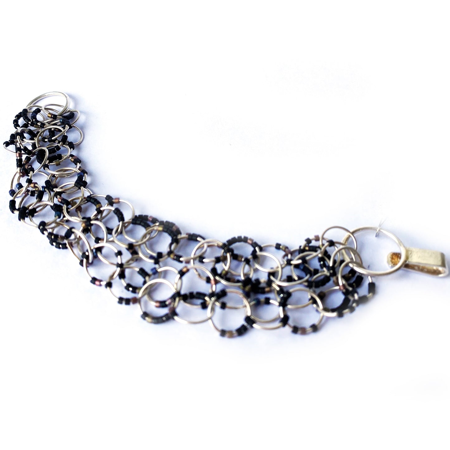 Pulsera multiargolla de Claudia Fajardo (4562599051364)